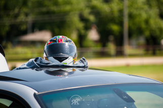 race car helmet on top of modified car Picture